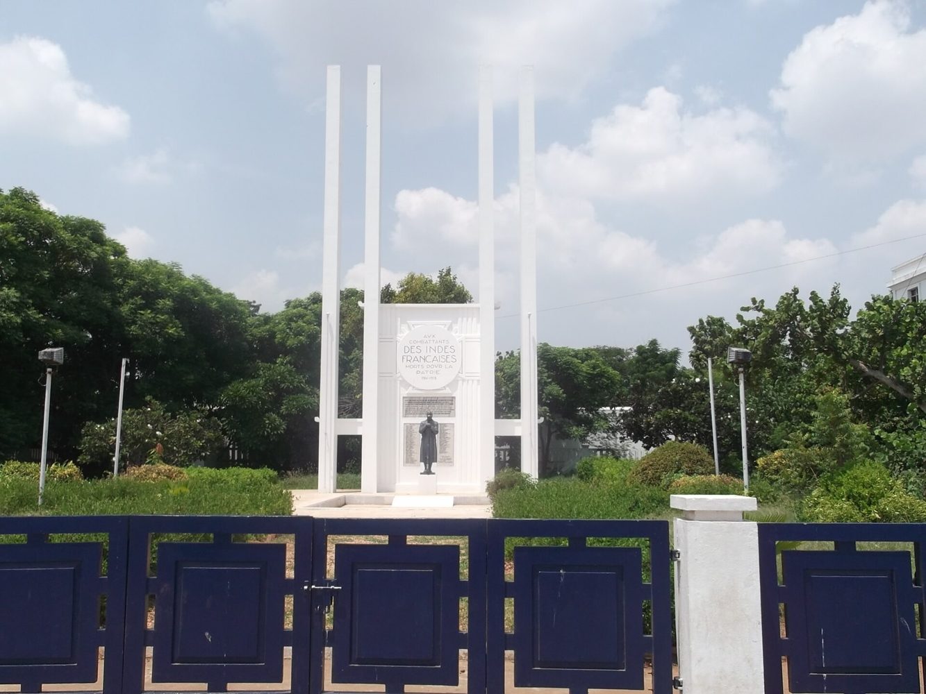 White columns of the French War Memorial on Goubert Avenue in Pondicherry